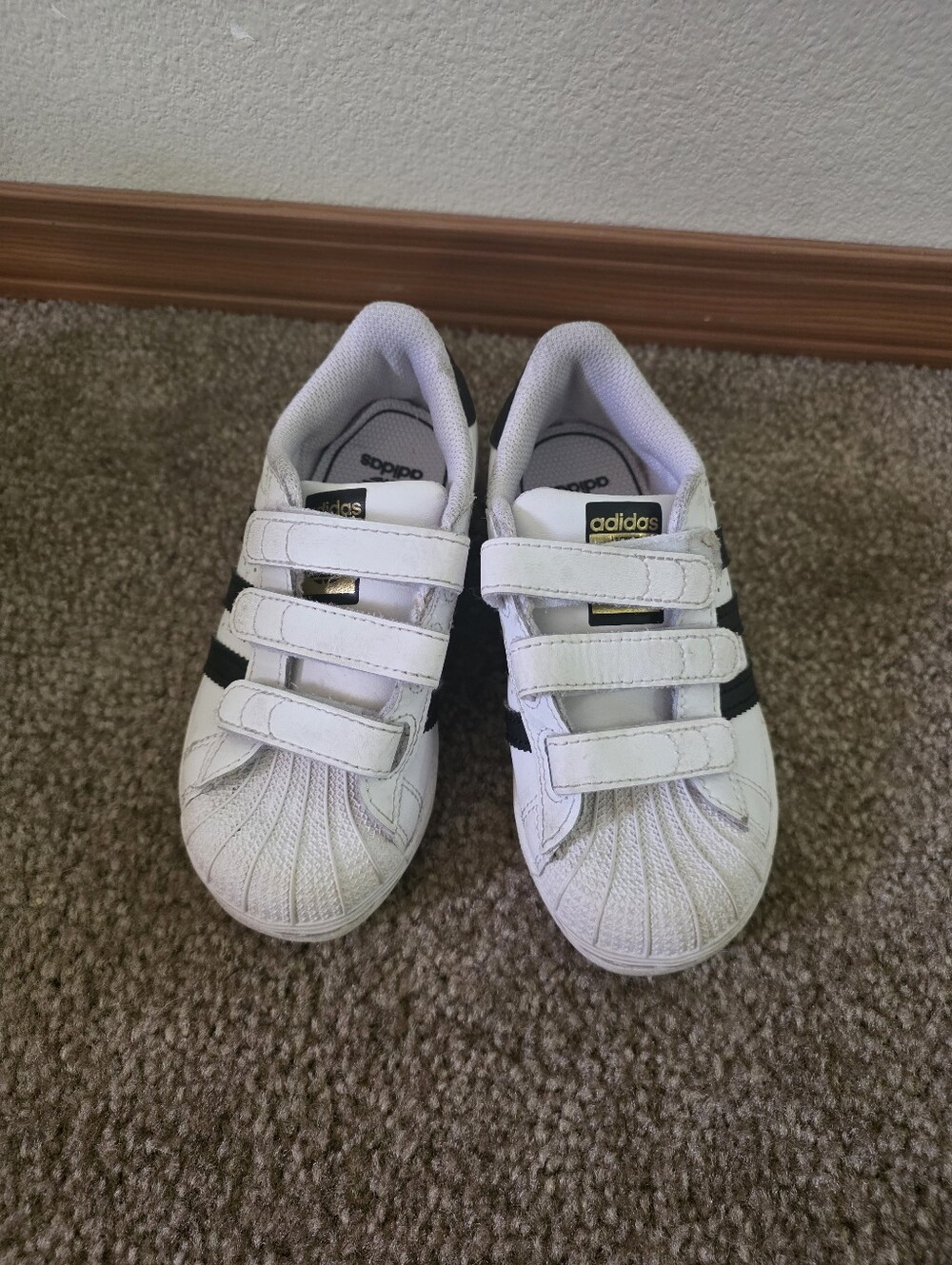 adidas Originals White and Black Kids Shoes with Gold Accents